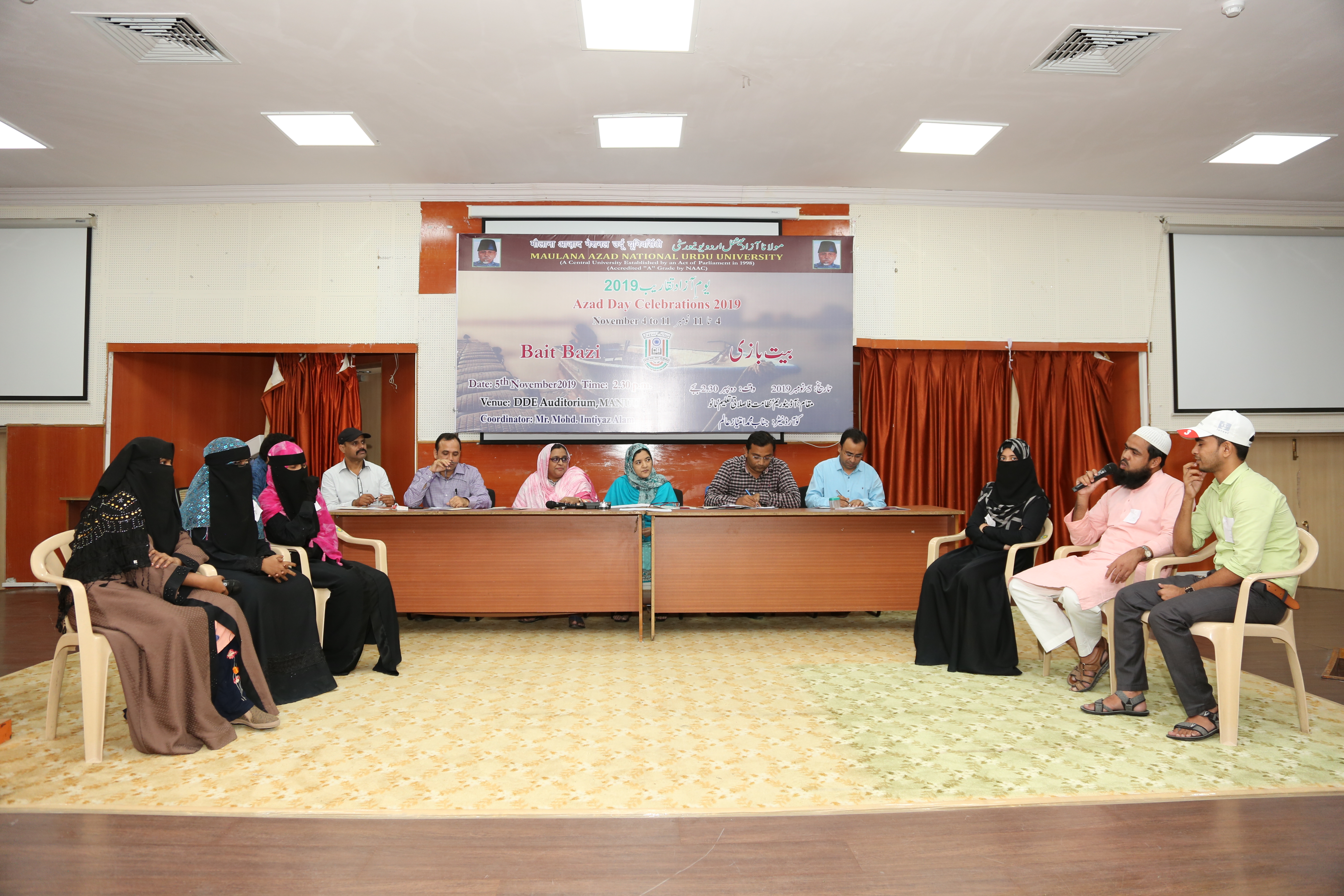 Students participating Bait Bazi. On Dias (L-R) Dr. Zafar Gulzar, Mr. Imtiaz Alam, Dr. Bi Bi Raza Khatoon, Dr. Mosarrat Jahan, Prof. MOhammed Abul Sami Siddiqui and Dr. Qaisar Ahmad.