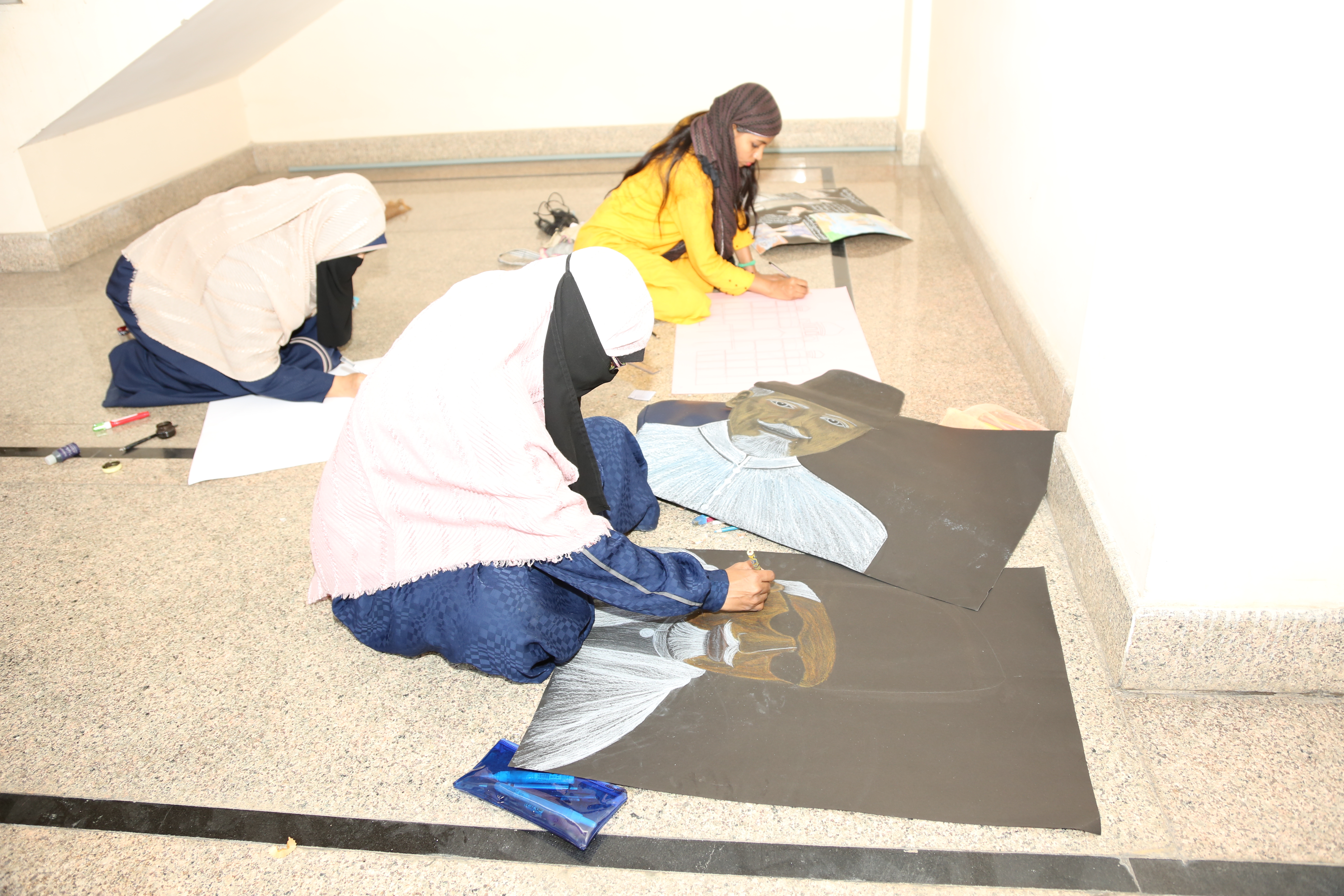 Drawing: Students participating painting competition.