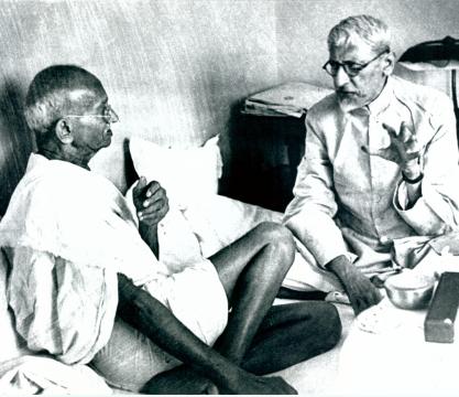 Mahatma Gandhi in conversation with Maulana Abul Kalam Azad.