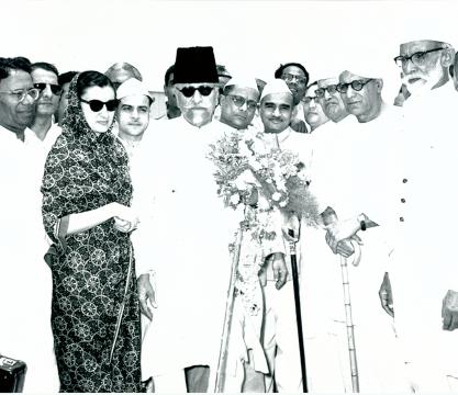 Maulana Abul Kalam Azad, Minister for Education, Government of India, returned to New Delhi on July 26, 1955, after conclusion of his tour of the United Kingdom and other European Countries. He was received at the Palam Airport by the Ministers of the Government of India Smt. Indira Gandhi and high officials of the United Education Ministry. Photo taken on his arrival at the Airport. (L. to R.) Shri Humayun Kabir, Secretary, Education Ministry; Smt. Indira Gandhi; Maulana Abul Kalam Azad; Shri K. C. Reddy, 