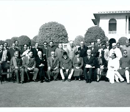 Group photograph taken at the luncheon party held by Maulana Abul Kalam Azad Minister for Education and Natural Resources and Scientific Research, Government of India, in honour of the Delegates tot eh Seminar on the “Contribution of Gandhian Outlook and Techniques to the Solution of Tensions Within and Between Nations” in New Delhi on January 10, 1953. The Prime Minister Shri Jawaharlal Nehru was also present. (sitting, Left to right): Kaka Saheb Kalelkar; Dr. Ralph Bunche (USA); Lord Boyd Orr (UK); Dr. Mo