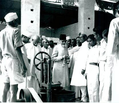 Maulana Abul Kalam Azad, Union Minister for Education, inaugurated a UNESCO Travelling Exhibition of Persian Miniatures at Vigyan Bhavan, New Delhi, on December 5, 1956. Photo Shows Maulana Abul Kalam Azad being conducted round the Exhibition after its inauguration.