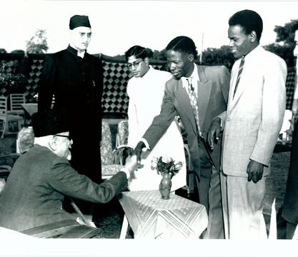 Maulana Abul Kalam Azad Minister for Education Government of India, in conversation with professor August Rieker, Minister of Education in Bavaria (leader) (first from right) and other members of the German Technical Mission when they called on the Minister in New Delhi on October 25, 1956. On the left of the Union Education Minister is Shri K. G. Saiyidain Secretary Ministry of Education