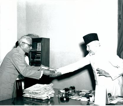Maulana Abul Kalam Azad, Union Education Minister receiving the first volume of ‘Vijnanam’ the only popular encyclopaedia in Malaylam from Shri Mathew M. Kushifvelil, Managing Editor of the Encyclopaedia when he called on the Minister in New Delhi on April 20, 1957.