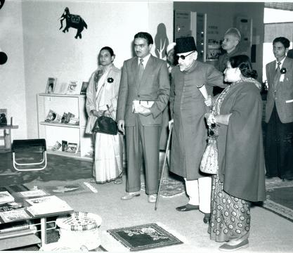 Maulana Abul Kalam Azad Minister for Education Government of India, being conducted round the Children’s Library Section of the All India Educational Exhibition being held in New Delhi on November, 1956.