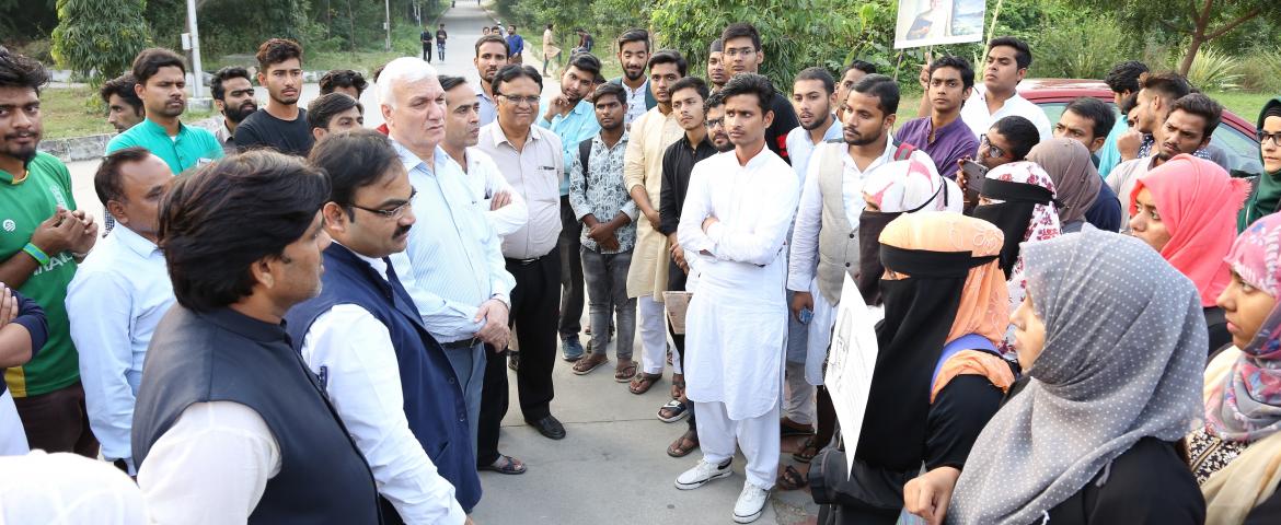 Azad Walk PVC: Prof Ayub Khan addressing the participants of Azad Walk at IMC. Prof. Noushad Husain, Prof. Mohammad Fariyad, Mr. Abid Abdul Wasay and others are also seen.