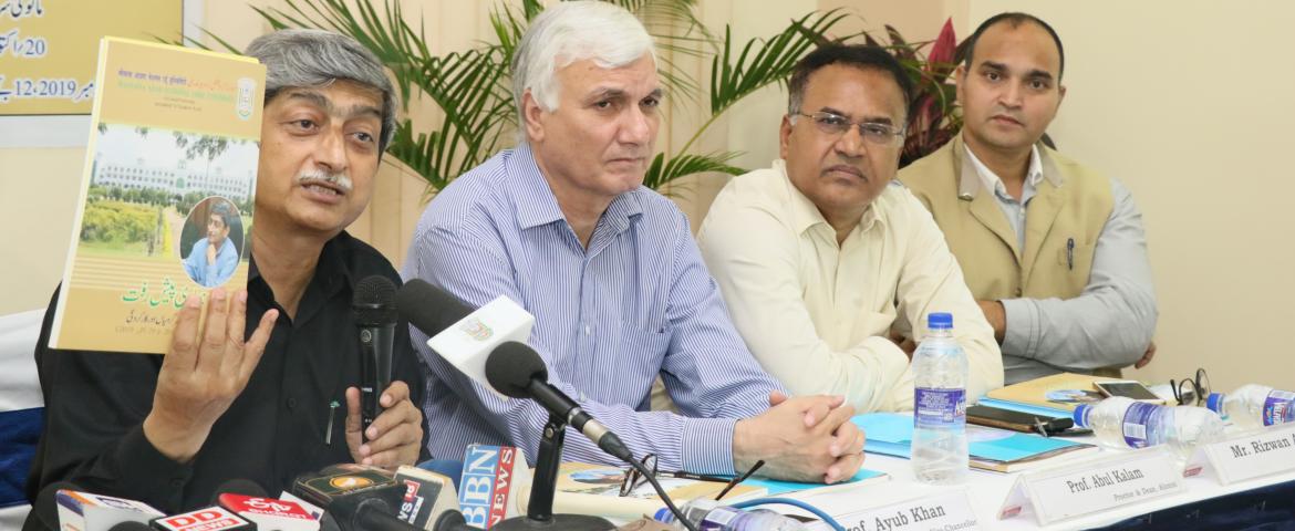 Dr.  Mohammad Aslam Parvaiz presenting the report.  L-R) Prof. Ayub Khan, Prof. Abul Kalam and Mr. Rizwan Ahamd also seen