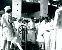 Maulana Abul Kalam Azad, Union Minister for Education, inaugurated a UNESCO Travelling Exhibition of Persian Miniatures at Vigyan Bhavan, New Delhi, on December 5, 1956. Photo Shows Maulana Abul Kalam Azad being conducted round the Exhibition after its inauguration.
